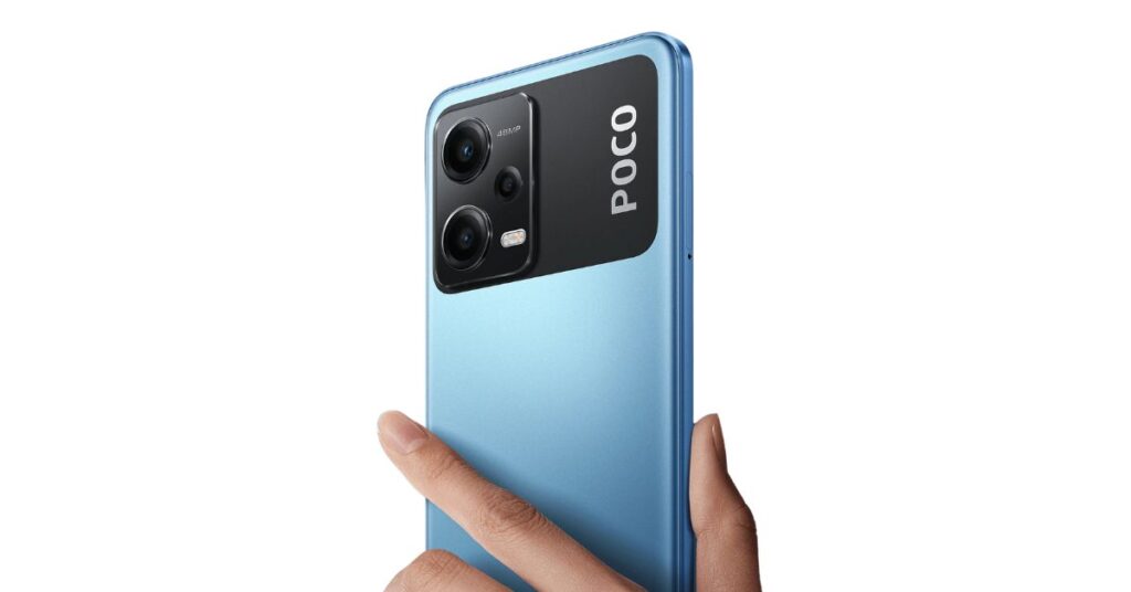 POCO X5 5G smartphone with Snapdragon processor and smooth gaming experience, someones hand holding it and back side of poco appears 