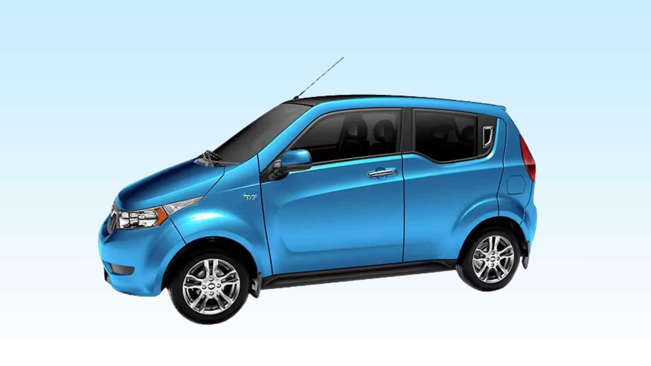 Front angle view of Tata Tiago EV in teal color showcasing its LED headlamps and modern electric design from Tata Motors Used Mahindra e2o Plus electric hatchback under ₹15 lakhs in resale market