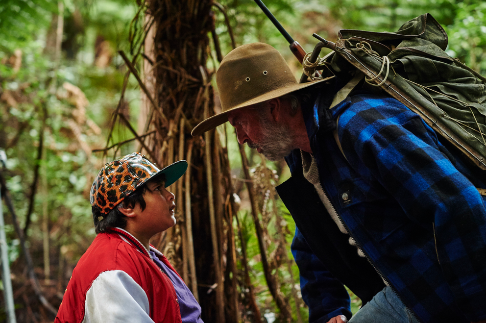 Hunt for the Wilderpeople (2016) two character were talking to each other in the woods