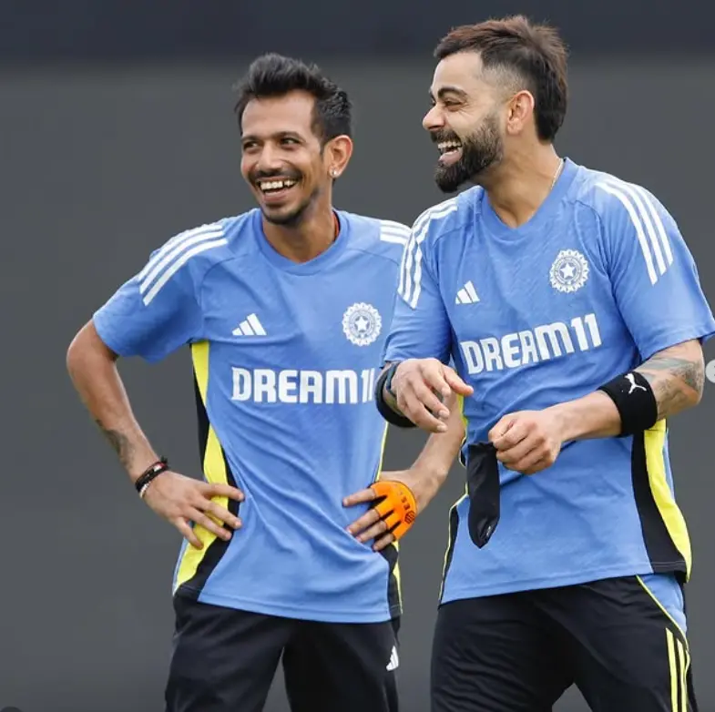 Virat Kohli and Chahal laughing in I ndia cricket jersy 