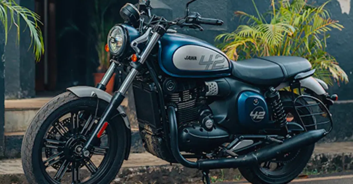 Jawa 42 FJ Retro parked on retro street classic street and plants in background