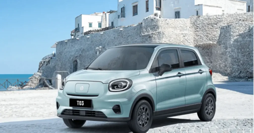 Light Blue Exterior (by stone wall) Leapmotor T03 India Launch stylish electric hatchback with 280km range in pastel blue exterior