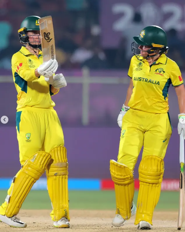 Australian openers celebrate partnership during Australia vs Bangladesh Women’s World Cup 2025 match in Visakhapatnam.